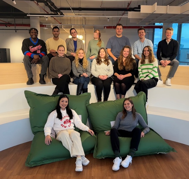 Timothy and 13 other trainees gathered in Riverty's Berlin office
