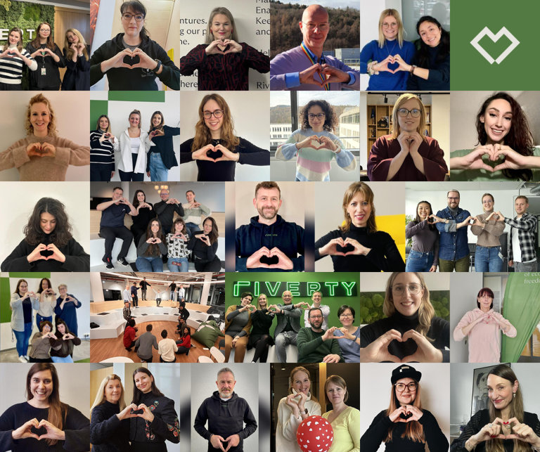 Image of Riverty employees forming a heart with their hands