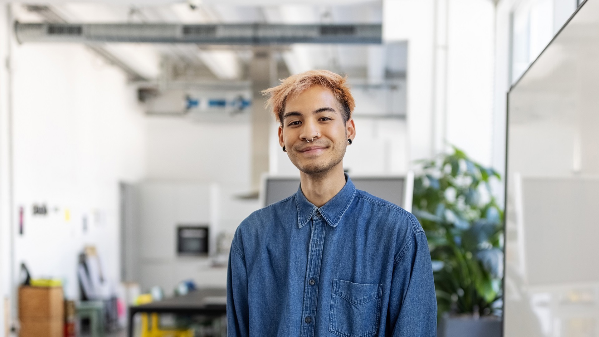 young man smiling into the camera