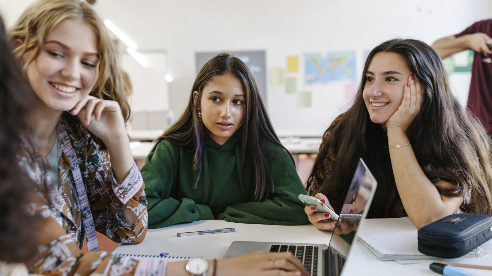 three girls studying